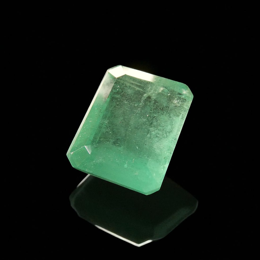 Colombian Emerald, 9.04 ct, Emerald Cut, IGI Certified, Natural Untreated: This exquisite natural Colombian emerald, weighing an impressive 9.04 carats, exemplifies the enduring allure and rarity of untreated emeralds from the legendary mining regions of Colombia. Certified 