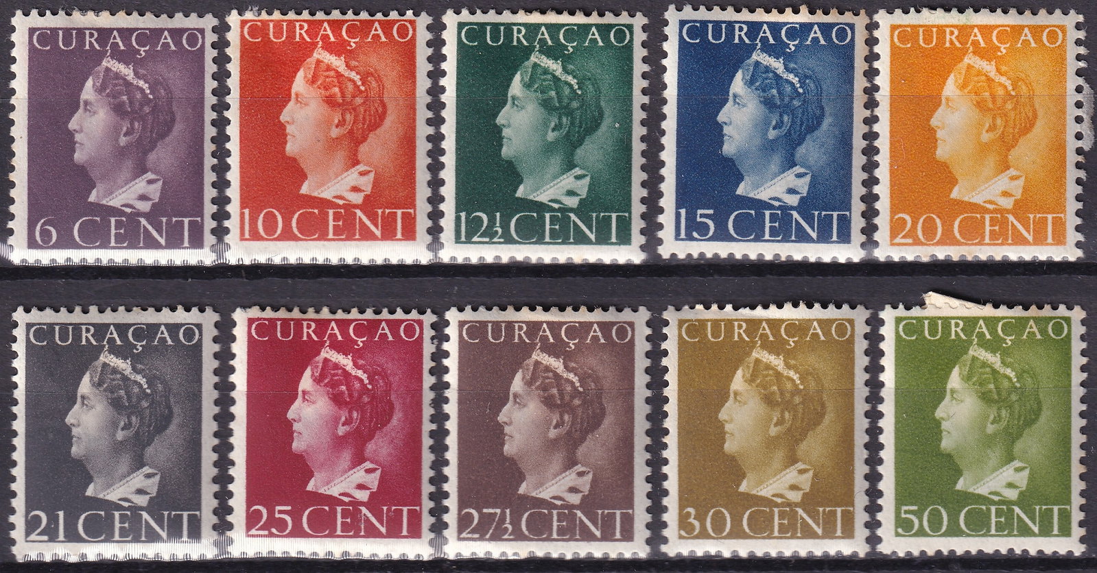 1941 1946 Curacao Scott 174 182 Queen Wilhelmina Set: A visually striking and well-balanced definitive series from Curaçao and the Netherlands Antilles, featuring Queen Wilhelmina in the refined “Konijnenburg” portrait style. This group spans th