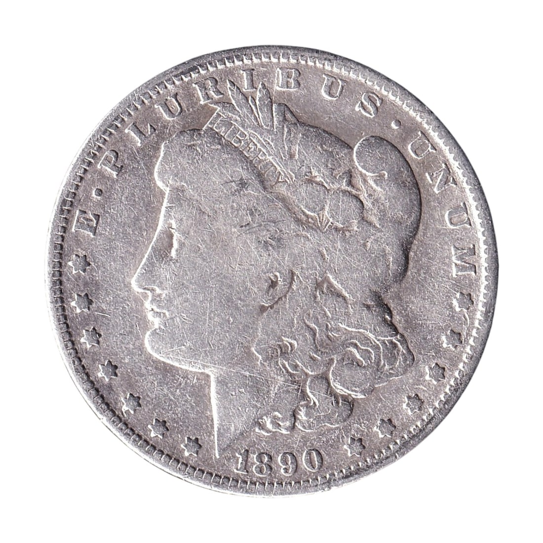 1890-O United States Morgan Silver Dollar New Orleans KM 110: 1890-O United States Morgan Silver Dollar struck at the New Orleans Mint, an important nineteenth-century American silver coin from the celebrated Morgan Dollar series of 1878-1921. The coin carries t