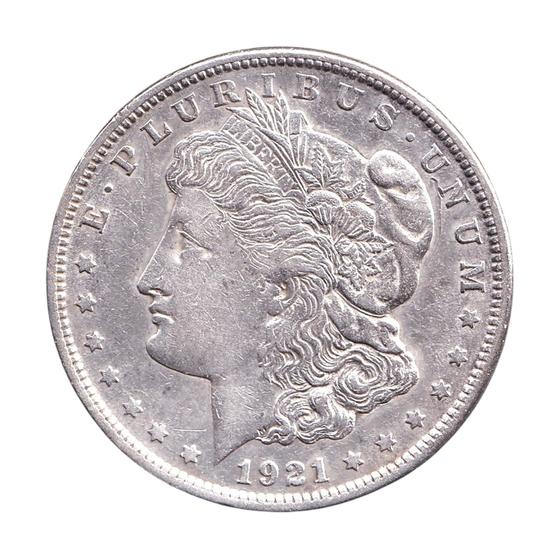 1921 United States Morgan Silver Dollar San Francisco KM 110: 1921-S United States Morgan Silver Dollar struck at the San Francisco Mint during the final year of the original Morgan Dollar series, an iconic American silver coin catalogued as KM 110. This histori