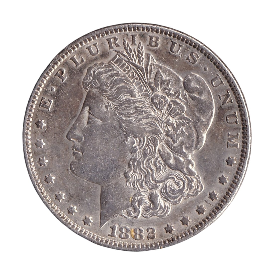 1882 USA Morgan Silver Dollar Philadelphia KM110 US-000087: Issued in 1882, this original United States Morgan Silver Dollar is catalogued as KM110 and Colnect US-000087 and represents one of the most iconic American silver coin designs of the nineteenth centu