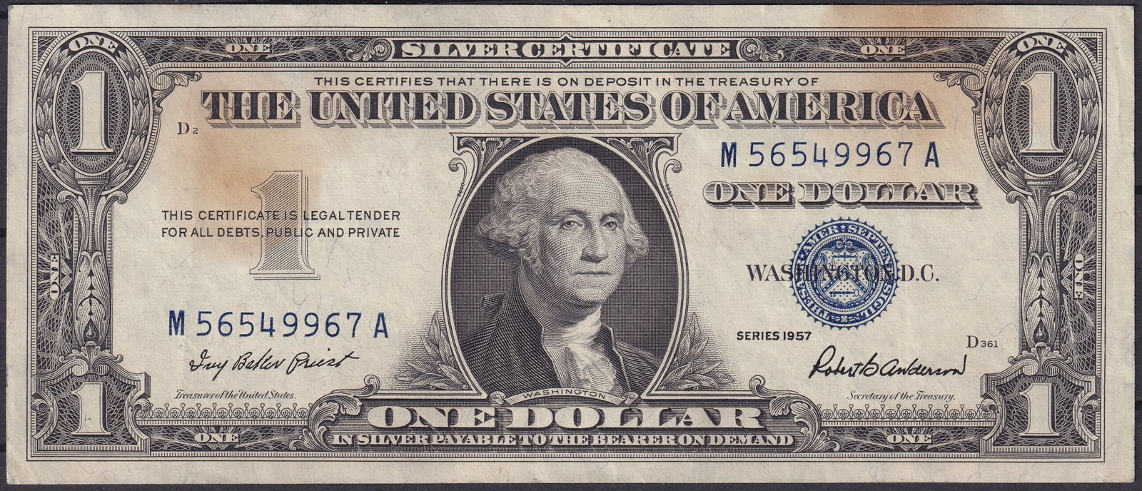 United States 1 Dollar Silver Certificate 1957 M56549967A: This historic United States one dollar silver certificate dated 1957 represents the final generation of American paper money redeemable in silver on demand and it clearly reflects the transition from 