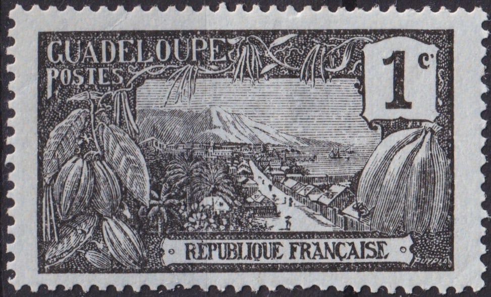 1905 Guadeloupe 1c Black Landscape, Scott 54: Issued between 1905 and 1907, this 1 centime black stamp from Guadeloupe belongs to the Landscape series and presents a finely executed typographic design engraved by G. Duval. The vignette depicts a 