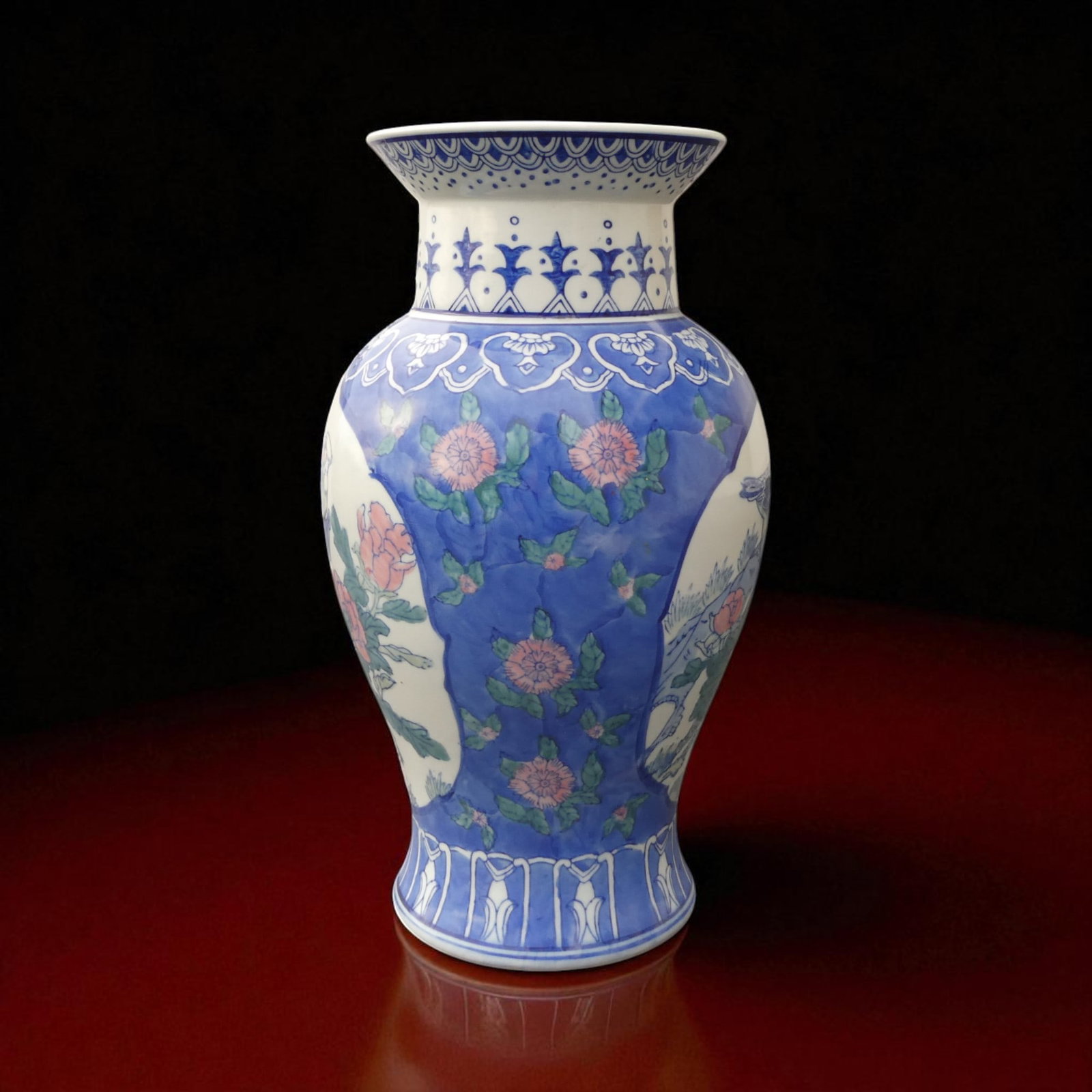Mid-20th Century Chinese Porcelain Vase with Hand-Painted Peony and Bird Motif, Marked Made in China: A finely crafted Chinese porcelain vase from the mid-20th century, decorated in a vibrant palette of underglaze blue and hand-painted enamels. The ovoid body is adorned with alternating panels of flow