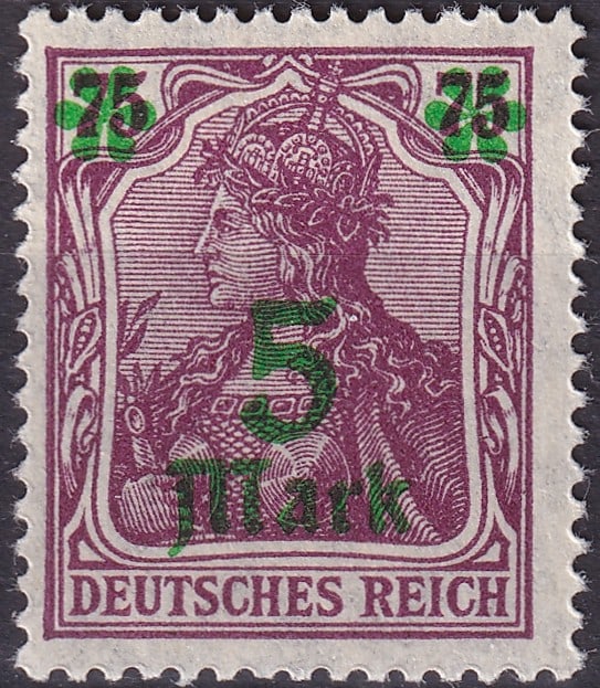 1921 Germany 5 Mark Germania Green Overprint on 75 Pf Violet (Scott 135 / Michel DR 156II): Issued in 1921 during the early years of the Weimar Republic, this striking 5 Mark overprint on the 75 Pfennig Germania stamp reflects Germany’s transition from Imperial to Republican postal issues 