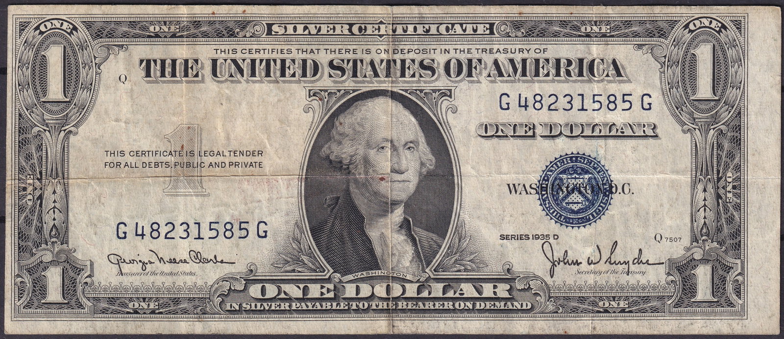 United States 1 Silver Certificate 1935D Series: A United States 1 Silver Certificate, Series 1935 D, bearing the familiar portrait of George Washington at center, flanked by ornate borders with bold “ONE” denomination counters. Printed in b