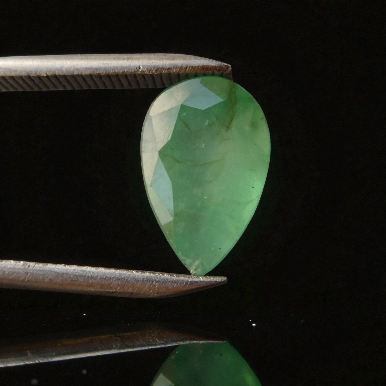 Natural Emerald Pear Mixed Cut 2.40 Carats IGI 574362518: This natural emerald certified by the International Gemological Institute in May 2023 presents a 2.40 carat pear mixed cut stone belonging to the beryl family, displaying a green blush hue with semi t