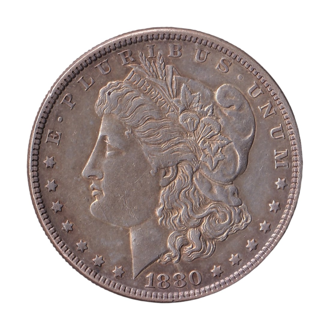 1880 USA Carson City $1 Morgan Silver Dollar KM 110: Issued in 1880, this original United States $1 Morgan Silver Dollar was struck at the Carson City Mint in Nevada and is catalogued as KM 110 and Colnect US-000087. This classic American silver dollar 