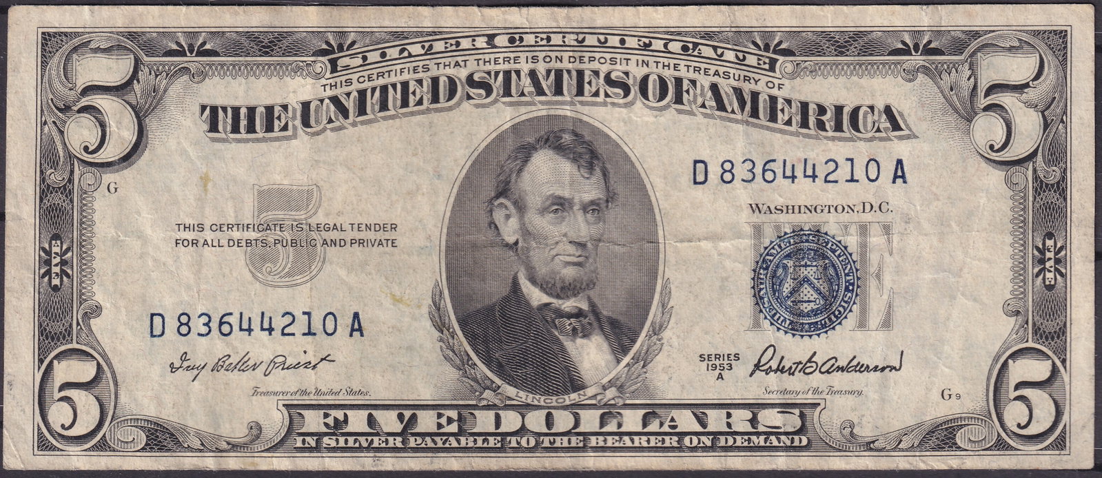 1953-A USA $5 Silver Certificate – Blue Seal – Fr. 1655 – Serial D83644210A – Lincoln: Issued by the United States as part of the Series 1953-A, this classic $5 Silver Certificate features a portrait of Abraham Lincoln on the obverse together with the distinctive blue Treasury seal and