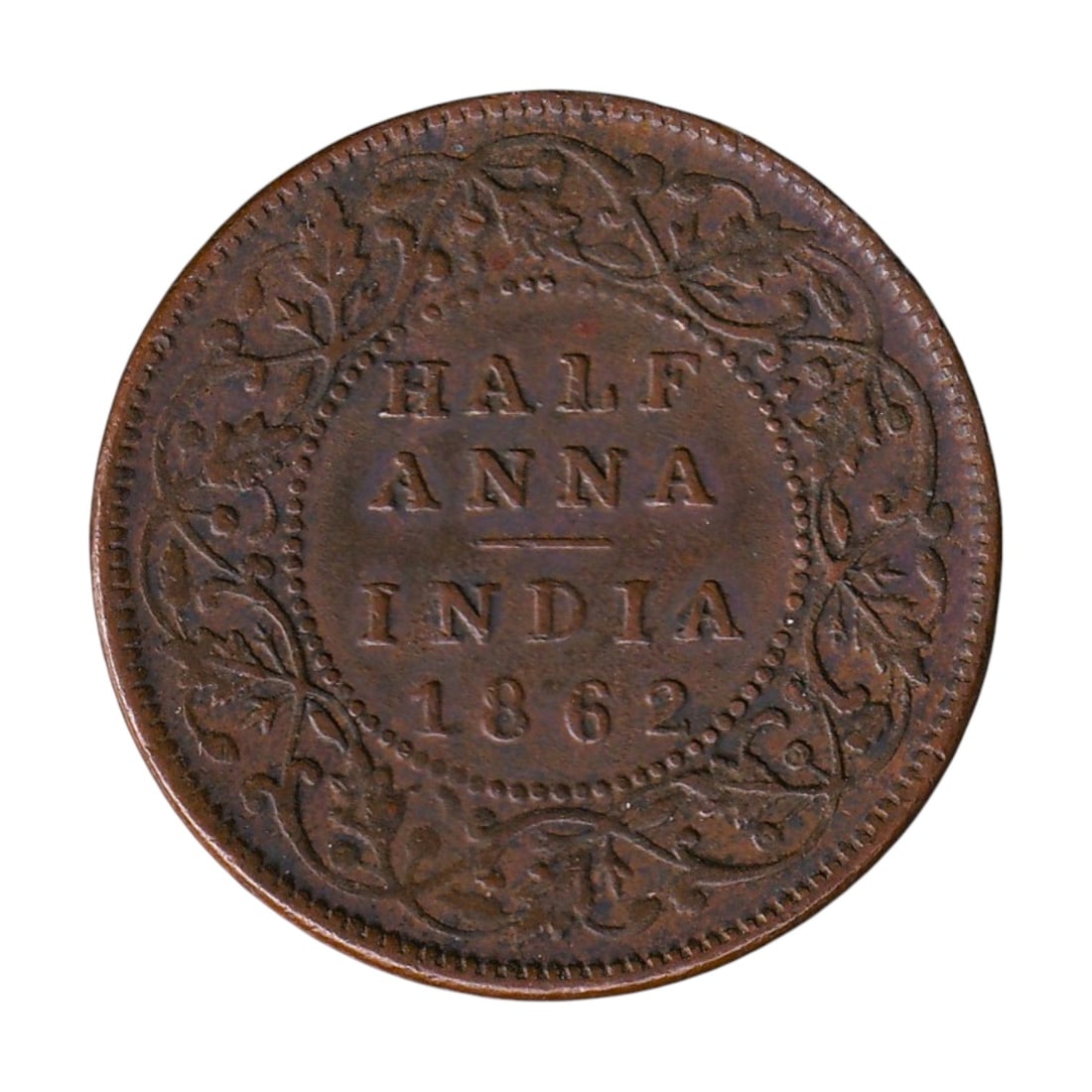 British India 1862 ½ Anna Queen Victoria Copper KM 468: Issued in 1862 during the reign of Queen Victoria, this substantial British India ½ Anna copper coin represents one of the classic circulating denominations of the early Crown administration fo