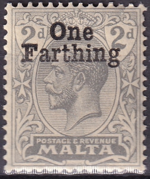 1922 Malta King George V OVP One Farthing Scott 129: This lot presents a One Farthing definitive stamp of Malta issued in 1922 during the reign of King George V and cataloged as Scott 129. The stamp originates from the long running definitive series por