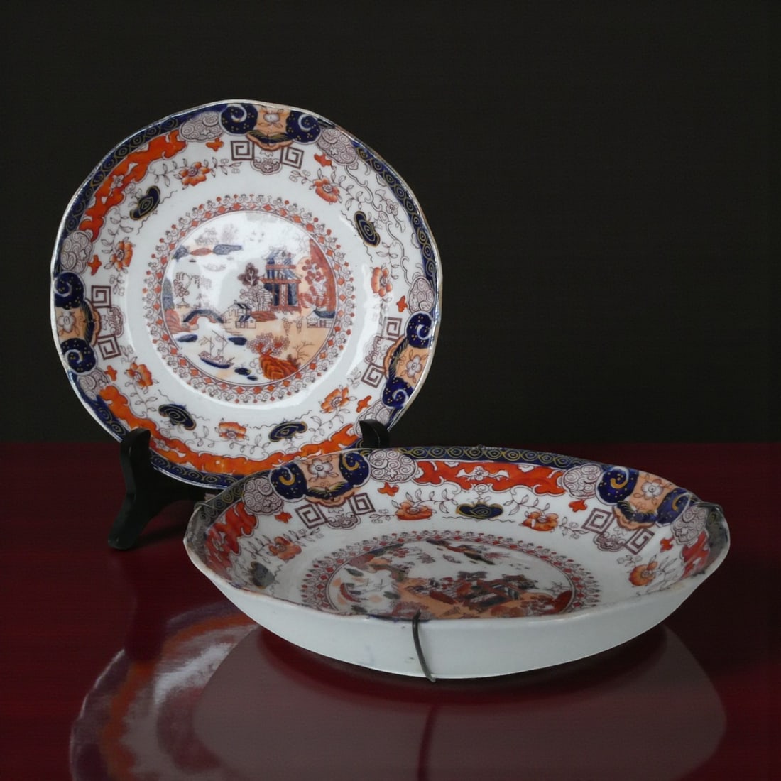 Late 19th Century Japan Imari Porcelain Plates Pair Hand Painted: This attractive pair of Japanese Imari porcelain plates dates to the late nineteenth century Meiji period and represents the enduring export tradition of hand painted Imari ware produced for Western m