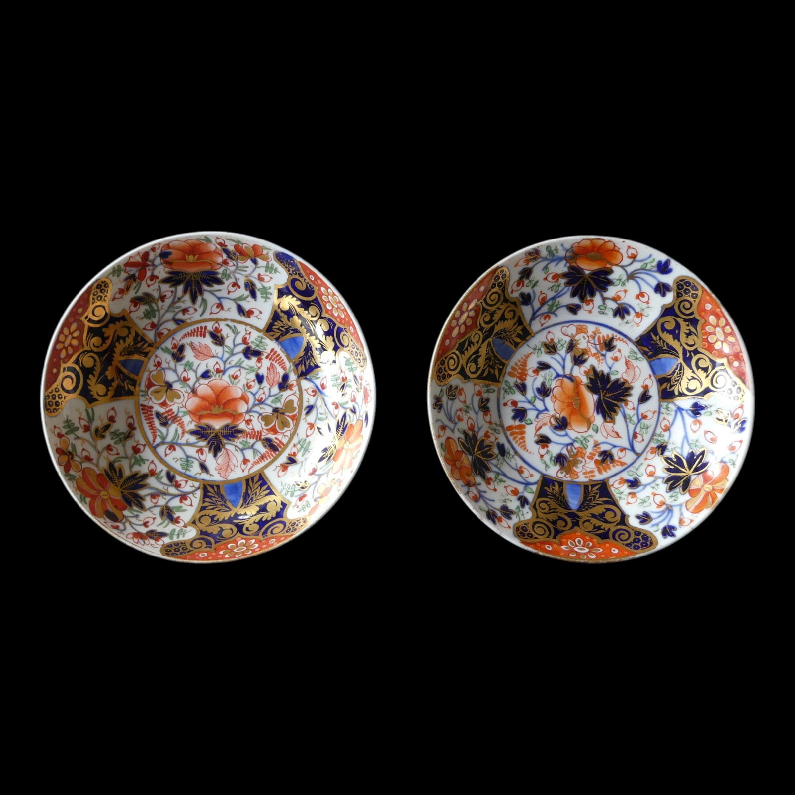 Pair of Japanese Imari Porcelain Dishes, 19th Century: A fine pair of Japanese Imari porcelain dishes, dating to the 19th century, each measuring 14 cm in diameter and weighing approximately 140–147 g. Decorated in the characteristic Imari palette of un