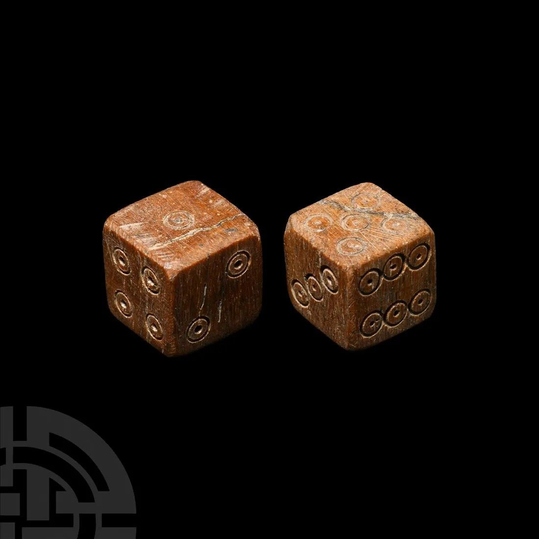 Roman Bone Dice Pair: Description1st-3rd century A.D. A pair of bone dice, each with ring-and-dot numerals and configured 1:6; 2:5; 3:4. 6.4 grams total, 11-12 mm (3/8 in.). Acquired 1960s-1990s. Late Alison Barker collect