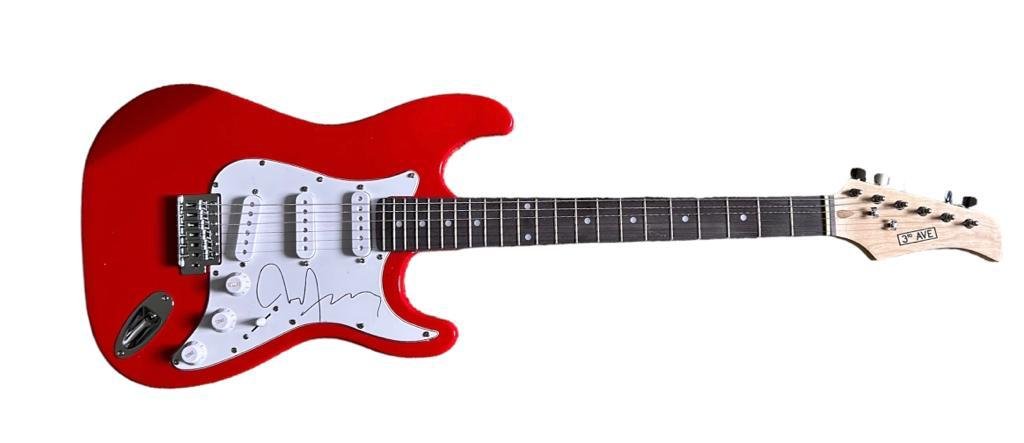 Bryan Ferry Roxy Music Signed Electric Guitar ACOA: This lot is an electric stratocaster style guitar, autographed by Bryan Ferry of Roxy Music. Item comes with third-party authentication from ACOA. Roxy Music became a successful act in Europe and Aust