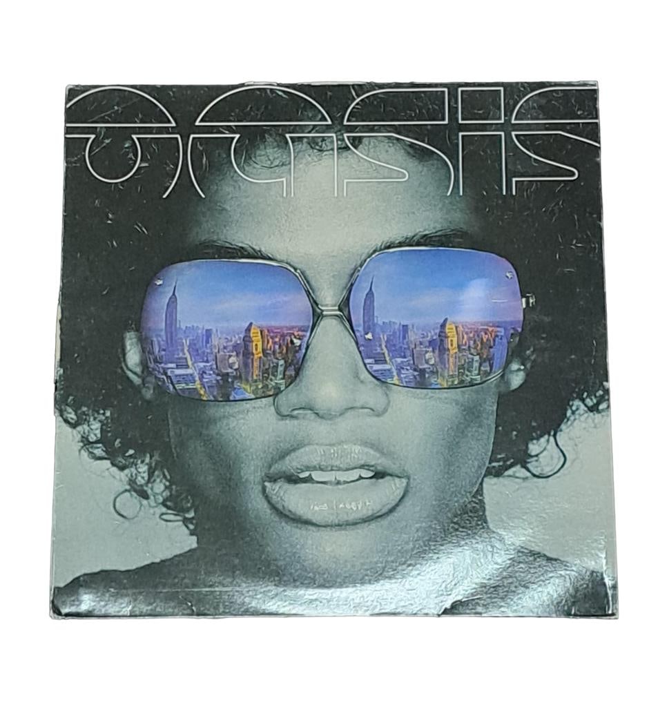 Oasis Who Feels Love? 12" Vinyl: This lot is a 12" vinyl (Who Feels Love?) by Oasis. The Beatles were an English rock band, formed in Liverpool in 1960, that comprised John Lennon, Paul McCartney, George Harrison and Ringo Starr. The