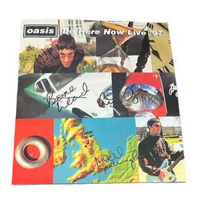 Oasis Signed Be Here Now 1997 Tour Programme: This lot is a 1997 tour programme autographed by Noel Gallagher, Bonehead, Alan White and Guigsy of Oasis. A lovely set of early Oasis autographs. Noel Gallagher has marked Manchester on the British