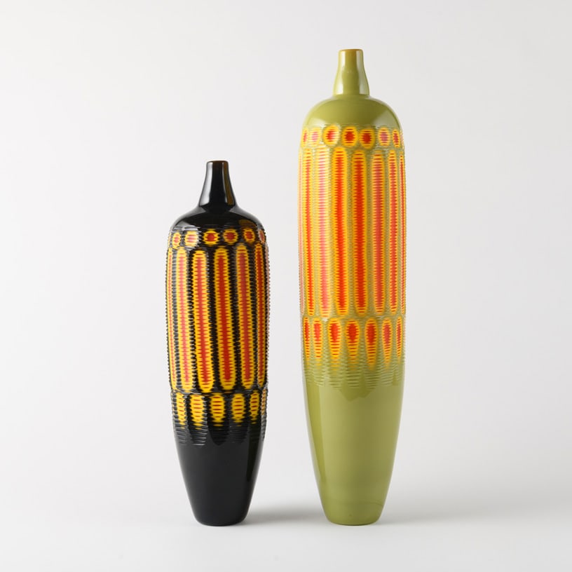 Eric DePan 'Guiro Bottle Pair': Eric DePan's Guiro Bottle Pair combines sophisticated layered color with rhythmic carving inspired by the ridged percussion instrument of the same name. DePan first builds layers of color through a de