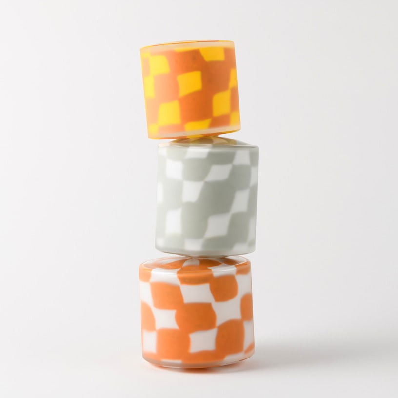 Nick Mount 'Murrini Stack': A stack of three colorful cylinders seems precariously balanced in Nick Mount's Murrini Stack, but beneath its playful personality lies nearly five decades of glassmaking mastery. Mount is one of the