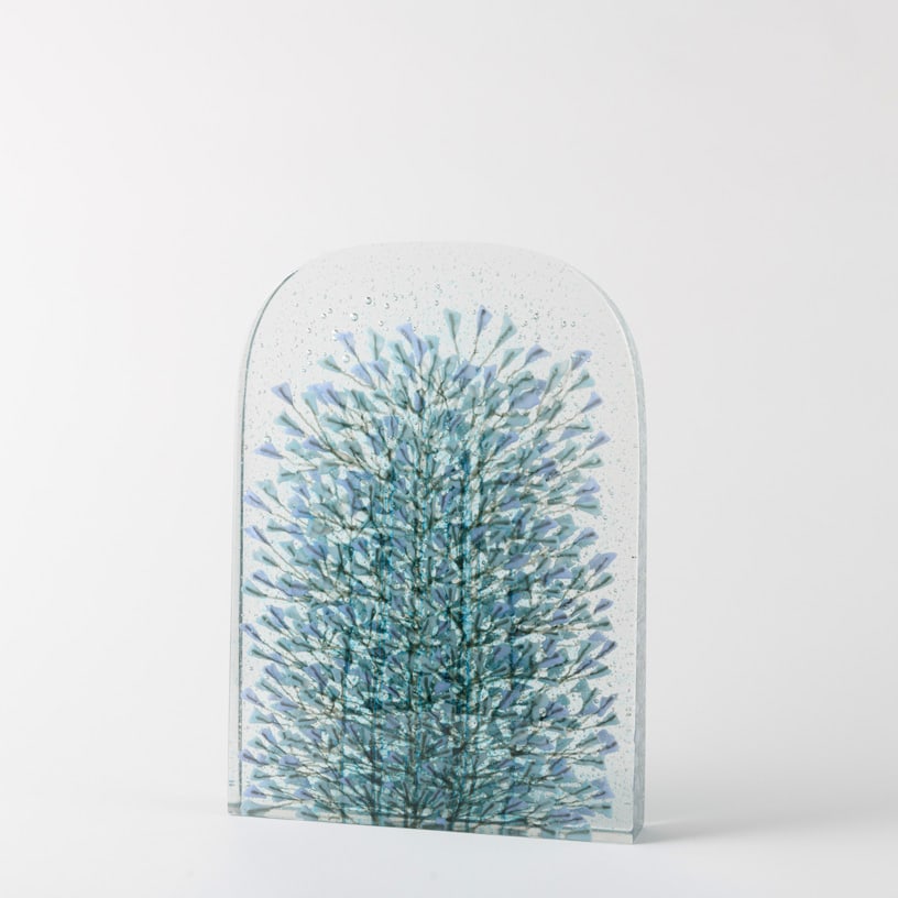 Emma Varga 'Awaiting Spring - Pale Blue': Emma Varga creates images inside glass. In Awaiting Spring -- Pale Blue, dozens of delicate blue and violet blossoms rise through a thick transparent slab, their stems multiplying and overlapping as