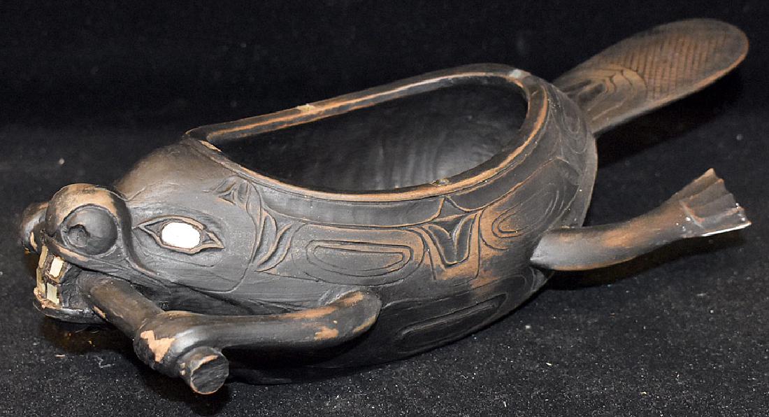 Northwest Coast Beaver-form Feast Bowl: Northwest coast Haida feast bowl of beaver form with abalone inlay. 3-1/2 in tall x 11-1/4 in long x 5 in wide. Provenance: From the collection of Paul Shaub, New Castle DE.