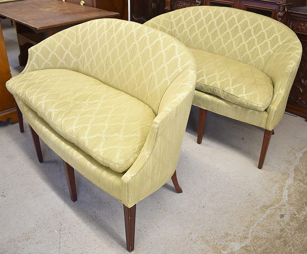 Pair of Federal-style Mahogany Settees: A pair of Federal-style mahogany settees with silk damask upholstery and tapering legs. 36 in tall x 62 in wide x 30 in deep.