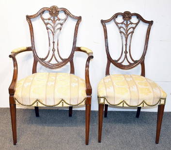 Twelve Karges Federal-style Carved Mahogany Dining: A set of twelve Karges Federal-style mahogany dining chairs: two armchairs and ten side chairs, all with carved and pierced splats and silk damask upholstered seats with decorative brass tacks. All ma