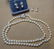 Pearl Necklace and Two Pairs of Pearl Earrings