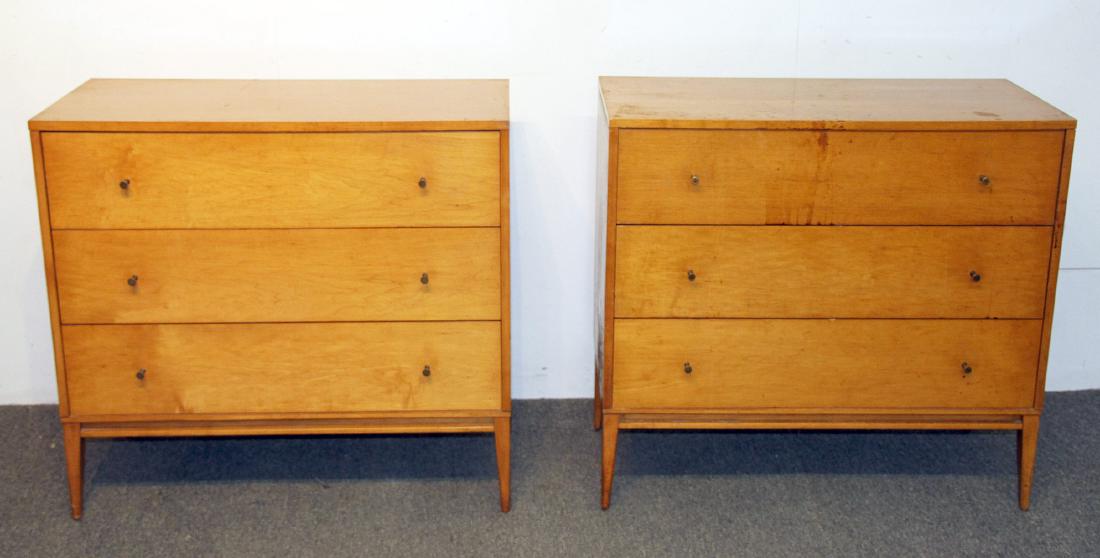 Pair of Paul McCobb Bachelor Chests: A Pair of Paul McCobb for Planner Group three-drawer maple bachelor chests. One has foil label. 33-1/2H x 36W x 19D in.