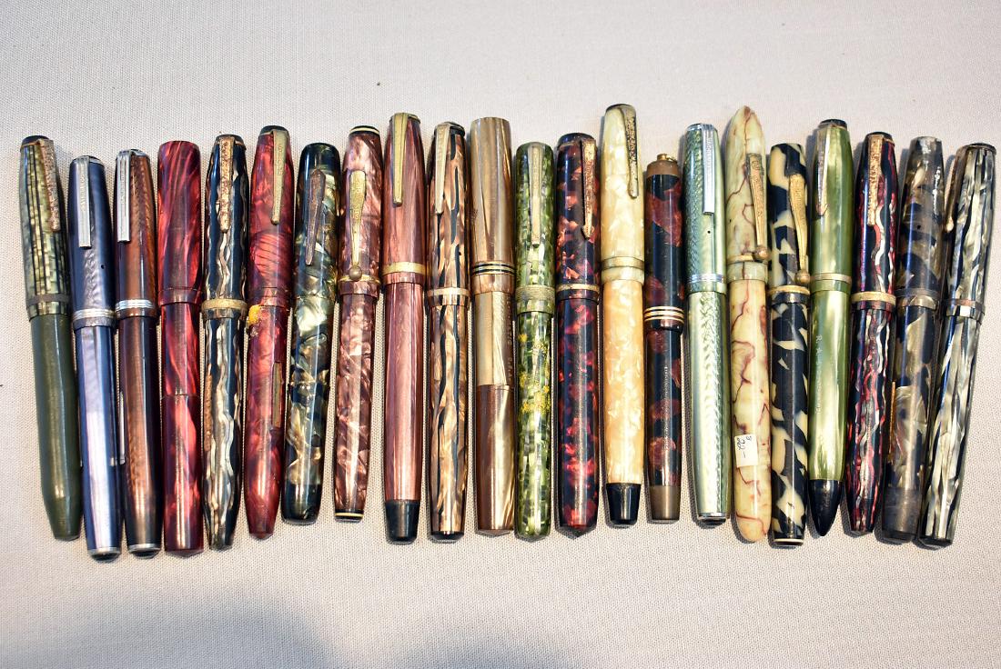 22 Vintage Fountain Pens: One with marked gold nib. Lot to include: Arnold lever fill with "Special Alloy" nib (nib broken at tip). EsterbrookJ-series lever fill with Esterbrook 1555 Gregg stainless steel nib. Unmarked vacuum 