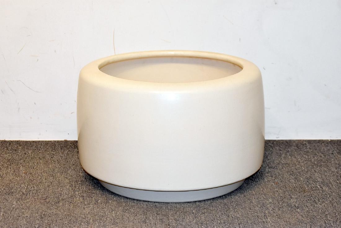 Large Architectural Pottery-style Planter: A large eggshell glazed pottery mid-century planter in the style of Architectural Pottery. Marked "USA" on base. 11-1/2in tall x 17-1/2in diameter.