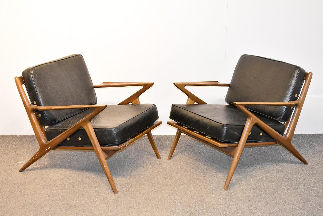 Pair of Poul Jensen Z Chairs: A pair of Poul Jensen "Z" lounge chairs for Selig with black vinyl upholstery. Unmarked. 26in tall x 30in wide x 32in deep.