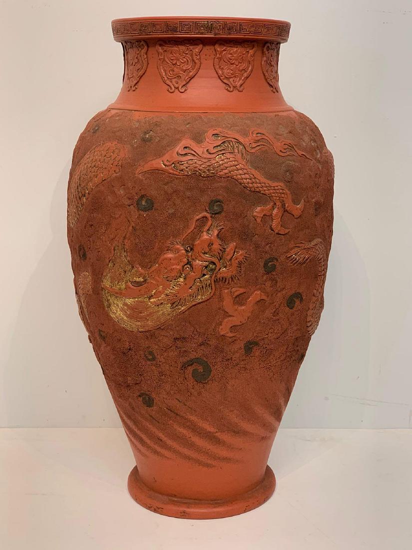 19th C. Japanese Redware Vase with Dragons: A 19th C. Japanese redware vase decorated with gilt dragons. Seal mark on base. 25in tall.