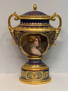 Monumental Royal Vienna Covered Urn: A monumental 19th C. Royal Vienna covered urn of classical form, with a blue lustre body featuring raised gilt accents, and a portrait of a woman with reflection, the verso with raised and beaded gilt