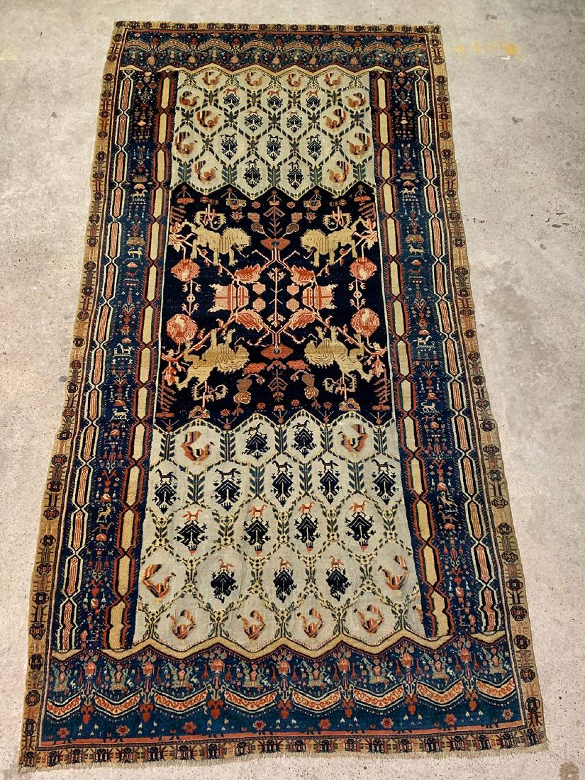 Persian Royal Souf Carpet: A fine Persian Royal Souf carpet with a central lion motif surround by a bird and figural design with geometric border. 10ft 4in x 5ft 2in. Provenance: Carpet was a gift from Reza Shah to Herbert Hoov