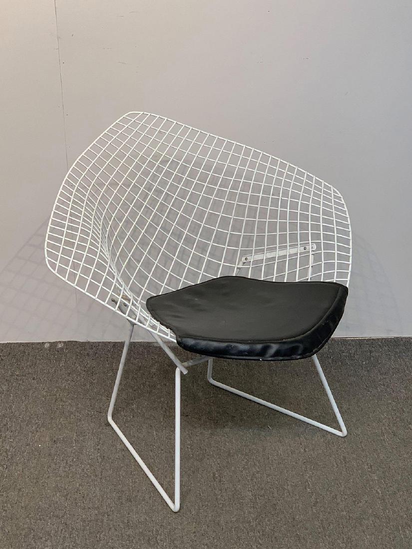 Harry Bertoia/Knoll Diamond Chair: A Harry Bertoia for Knoll white enameled "Diamond" chair with black seat pad. Unmarked. 30in tall x 33in wide x 28in deep.