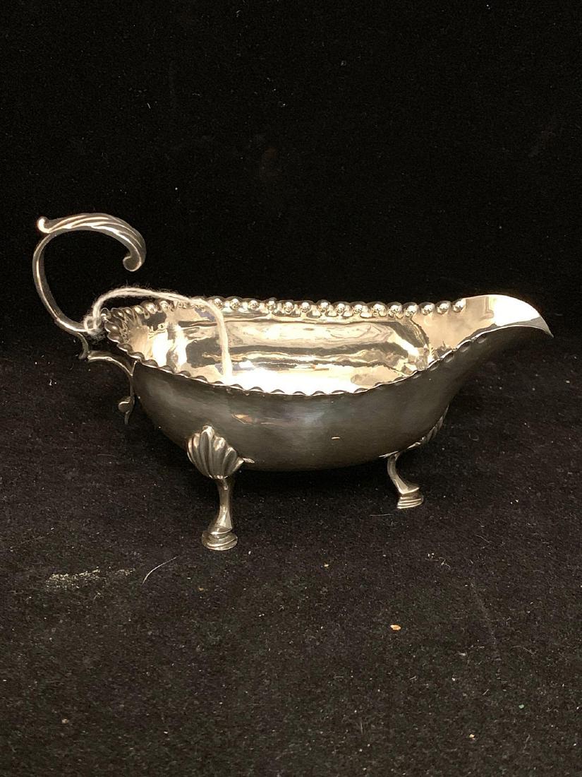 George III Silver Cream Boat: A George III silver cream boat, London, 1781, Hester Bateman maker. 5-1/2in long.