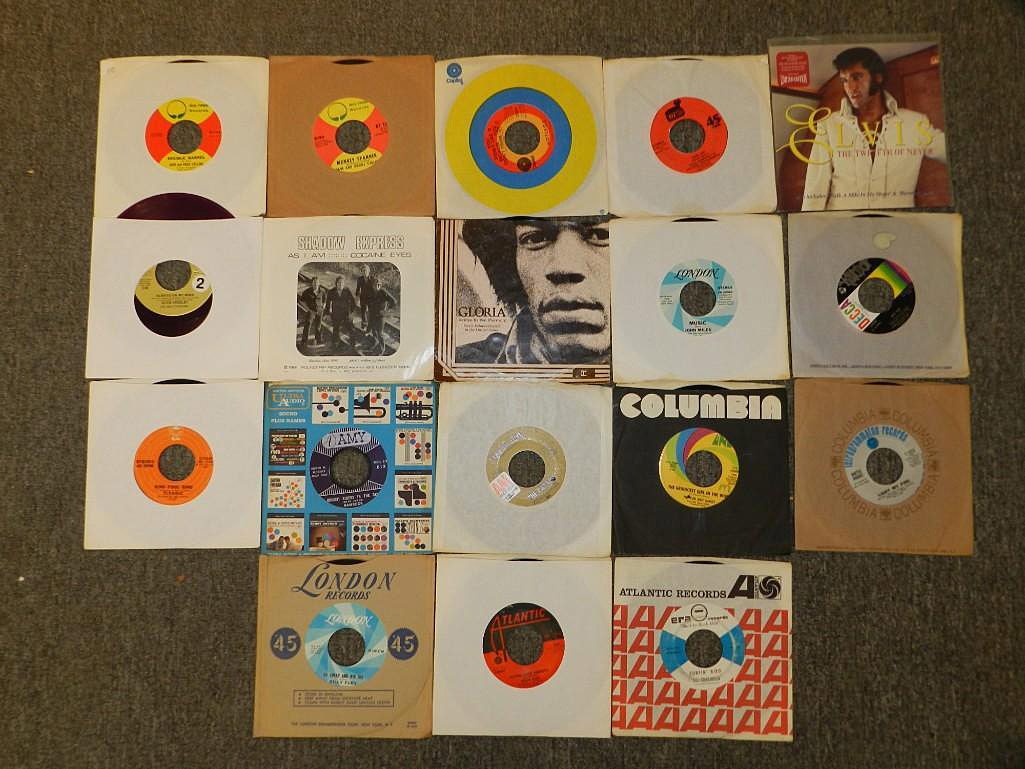 85 Assorted Rock and R&B 45RPM Records: A grouping of 85 assorted rock and R&B 45rpm records including Elvis, Led Zeppelin, James Gang, Ronettes, Guns n' Roses, The Lemon Pipers, etc. Including some colored vinyl and picture sleeves.