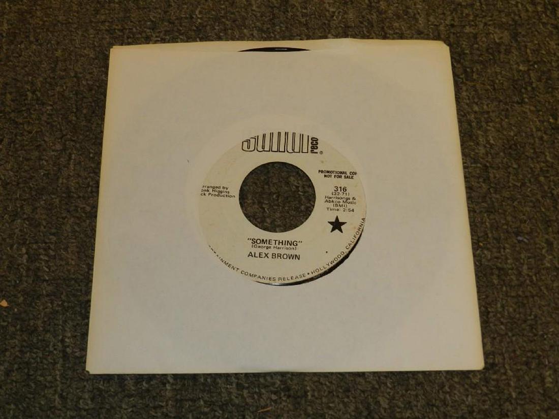Alex Brown I'm Not Responsible/Something 45 Record: An Alex Brown 45rpm record with songs "I'm Not Responsible" and "Something". Sundi white label promotional (VG visual grade)