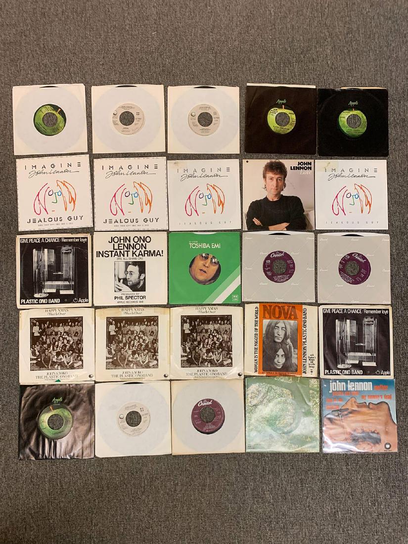 94 Assorted John Lennon Related 45RPM Records: A grouping of 94 assorted John Lennon-related 45rpm records including imports and colored vinyl.