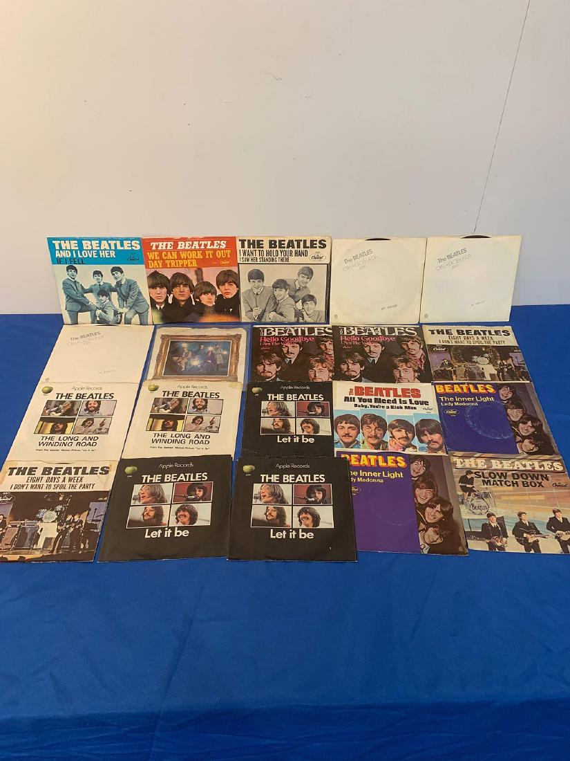 41 Beatles 45RPM Picture Sleeves: A grouping of 41 Beatles 45rpm picture sleeves; 40 come with the record, 1 empty sleeve. Both original and reissues, a few imports, mostly U.S. issues.
