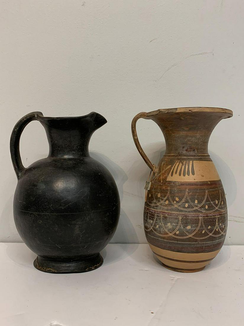 Pair of Etruscan Ceramic Vessels: A pair of Etruscan pottery vases, 4th or 5th Century. Note states that they were purchased directly from the University of Pennsylvania Museum of Archaeology in 1965.