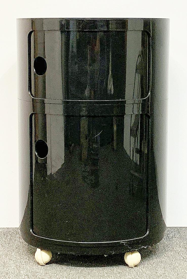 Kartell Stacking Modular Cabinet: A Kartell stacking cabinet system on casters designed by Anna Castilli Ferrieri. Marked. 25-3/4in tall x 16-1/2in diameter. Provenance: The Adelman Estate Collection, Hockessin DE.