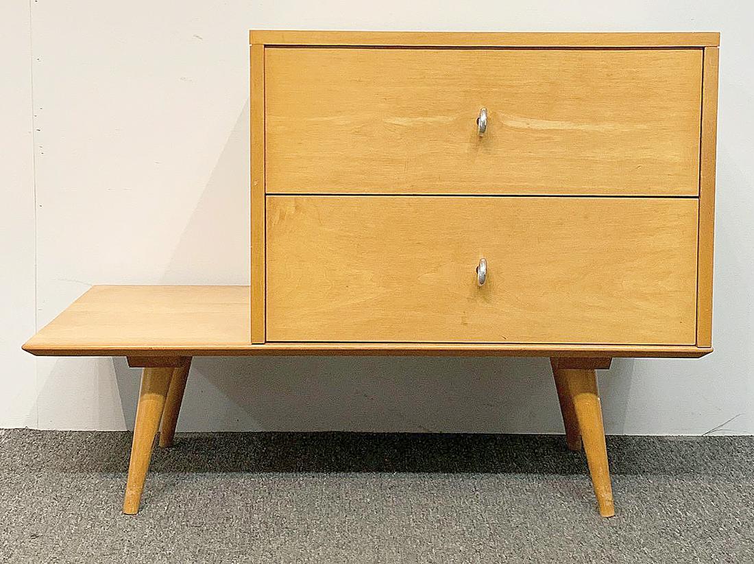 Paul McCobb Planner Group Cabinet and Table: A Paul McCobb Planner Group birch two-drawer cabinet with ring pulls on table base. Unmarked. 26-1/4in tall x 36in wide x 18in deep. Provenance: The Adelman Estate Collection, Hockessin DE.