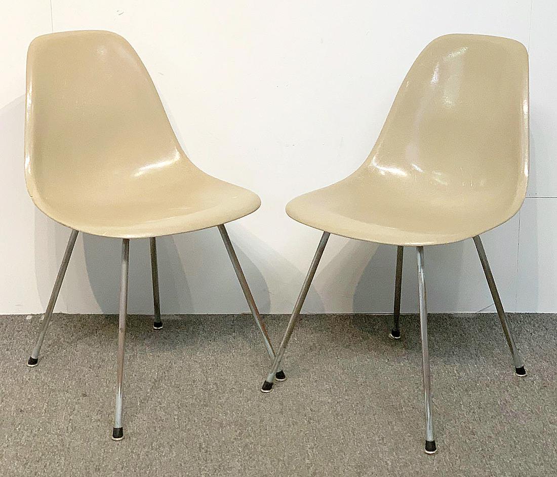 Two Charles & Ray Eames Shell Chairs: Two Charles & Ray Eames for Herman Miller fiberglass shell chairs with early "X" bases. Bases stamped with "d". 31in tall x 18-1/2in wide x 18in deep. Provenance: The Adelman Estate Collection, Hockes