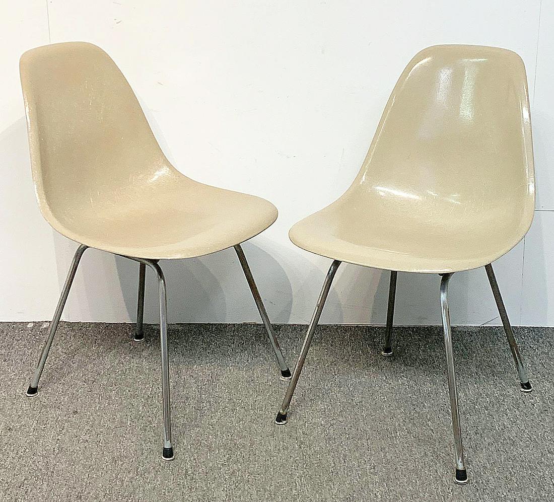 Two Charles & Ray Eames Shell Chairs: Two Charles & Ray Eames for Herman Miller fiberglass shell side chairs with "h" bases. 31-1/2in tall x 18-1/2in wide x 18in deep. Provenance: The Adelman Estate Collection, Hockessin DE.