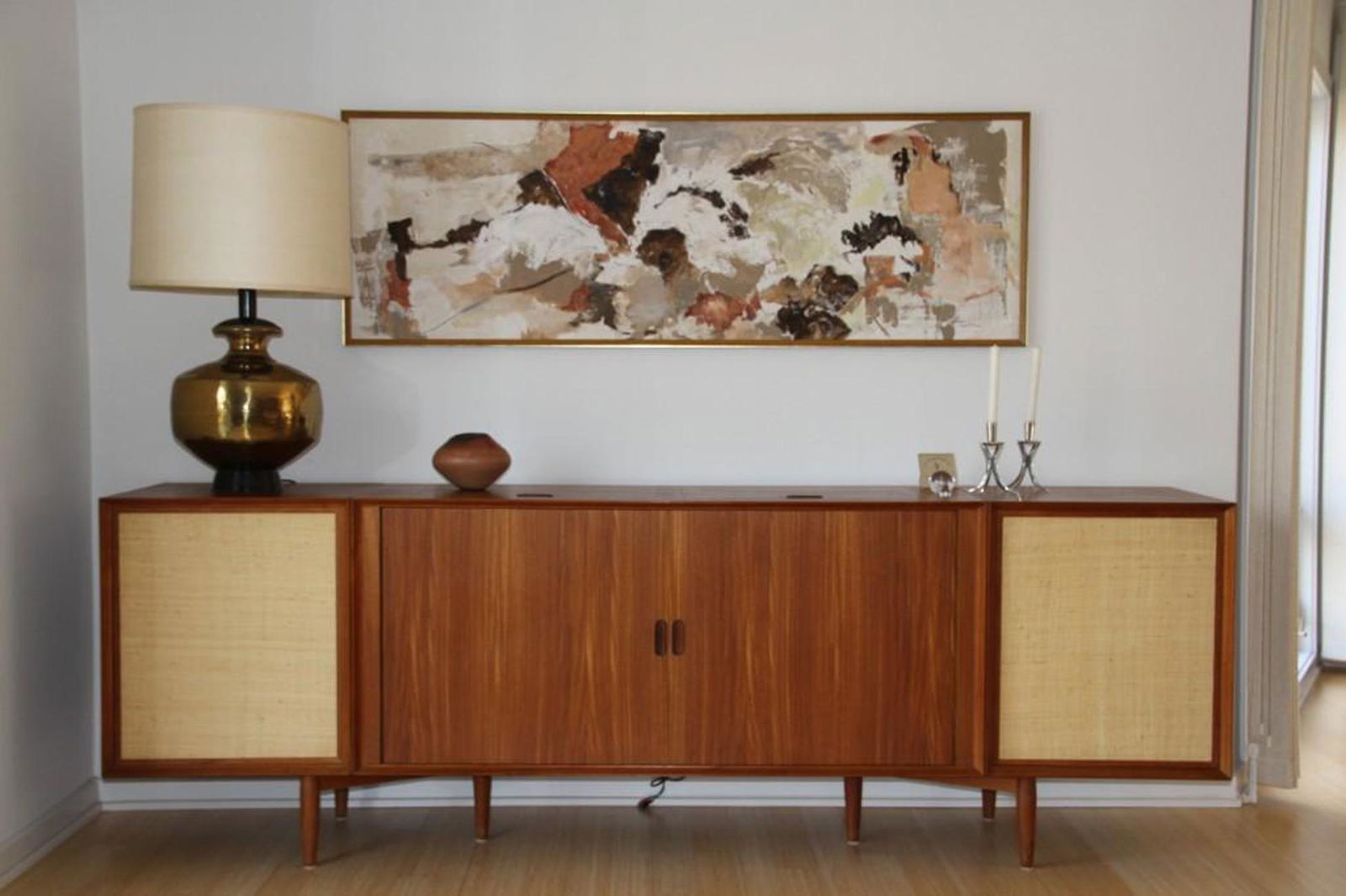 Arne Vodder Teak Stereo Console w/Speaker Cabinets: A rare Arne Vodder for Sibast Danish teak stereo console with two lift-top compartments and tambour doors, flanked by two speaker cabinets holding JBL speakers. 32in tall x 95-1/2in long x 20in deep.
