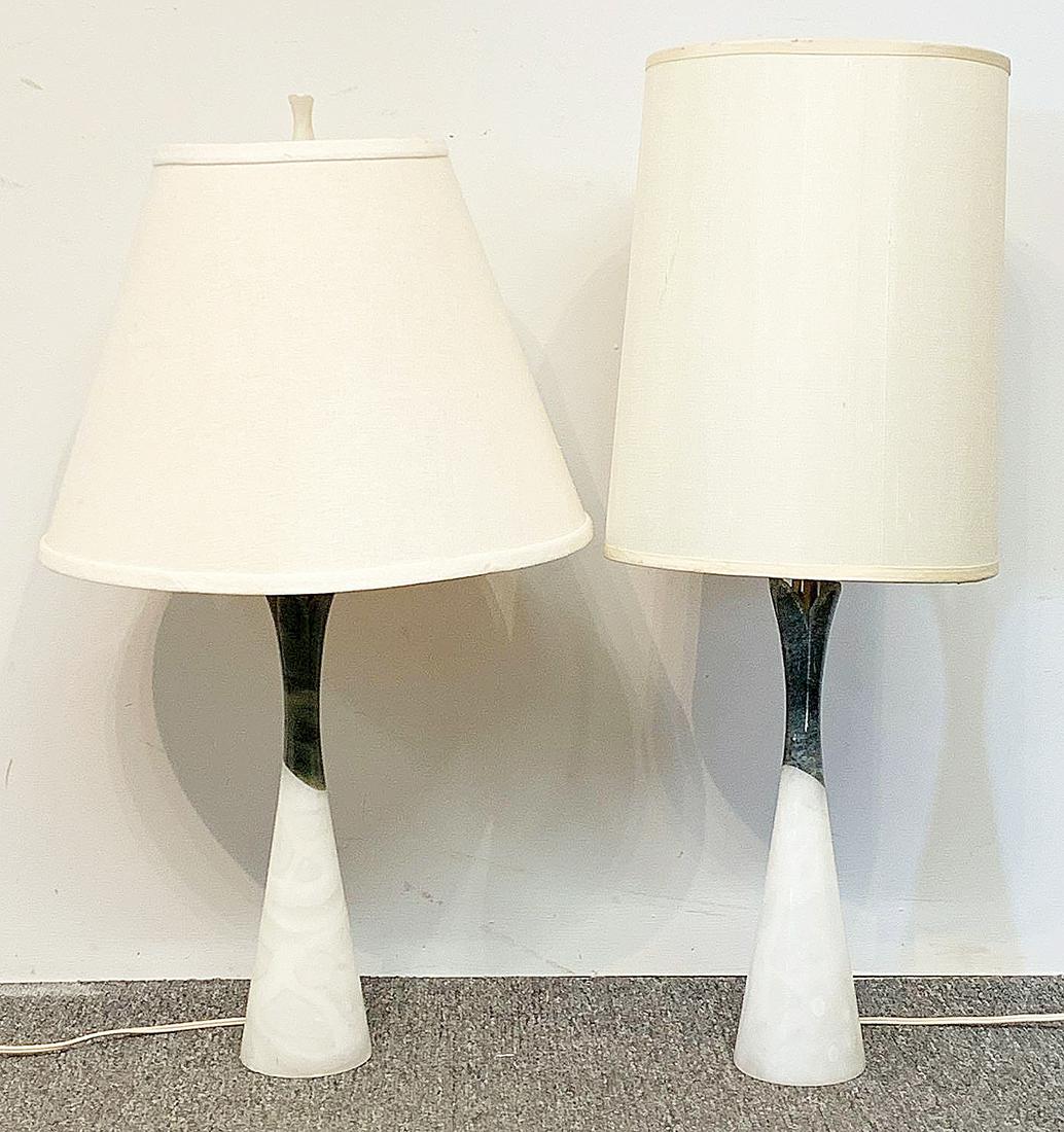 Pair of Italian Modern Alabaster Table Lamps: A pair of Italian modern two-tone alabaster table lamps. Bases: 13in tall. Height to top of harp: 23in. Provenance: The Adelman Estate Collection, Hockessin DE.