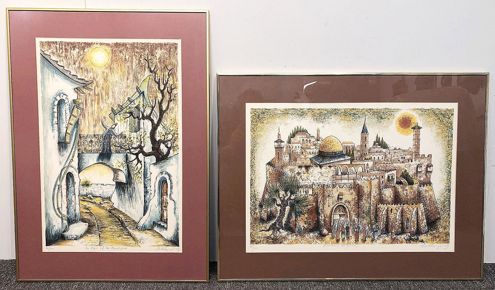Pair of Zvi Livni Art Prints, City Scenes: A pair of prints by artist Zvi Livni, both city scenes. Mat openings: 17-1/4in tall x 24-1/4in wide and 24in tall x 16in wide. Provenance: The Adelman Estate Collection, Hockessin DE.