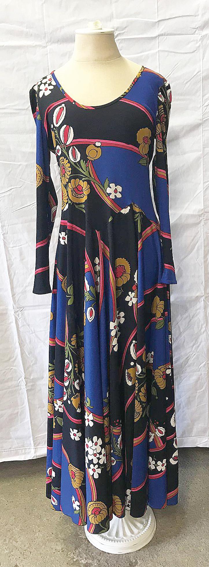 Vintage Martieri di-Roma, New York Dress: A Vintage Martieri di Roma, New York long dress in polyester with floral design on a black and royal blue field, with zipper and hook-and-eye closure in back. Original label, made in Italy. Size 8. Pr